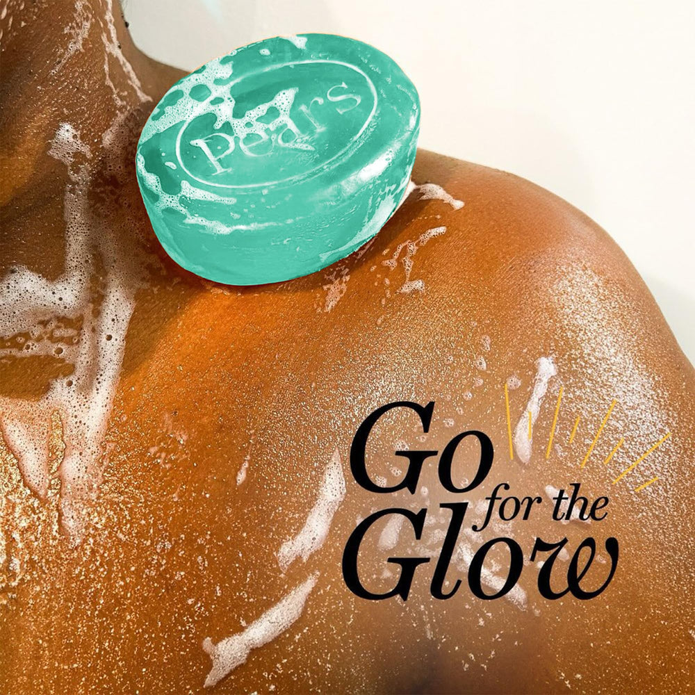 Close-up of Pears soap lather with light, refreshing texture.