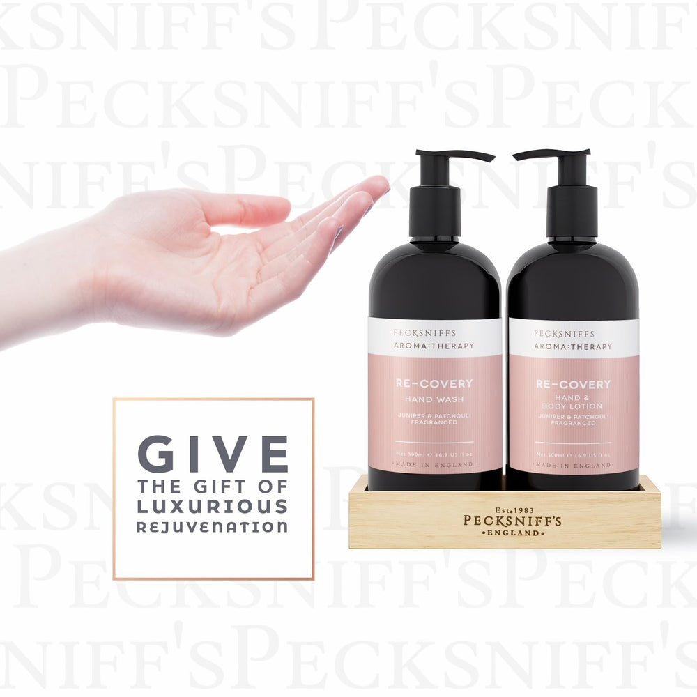 Pecksniff's caddy on a bathroom counter with warm aroma cues.