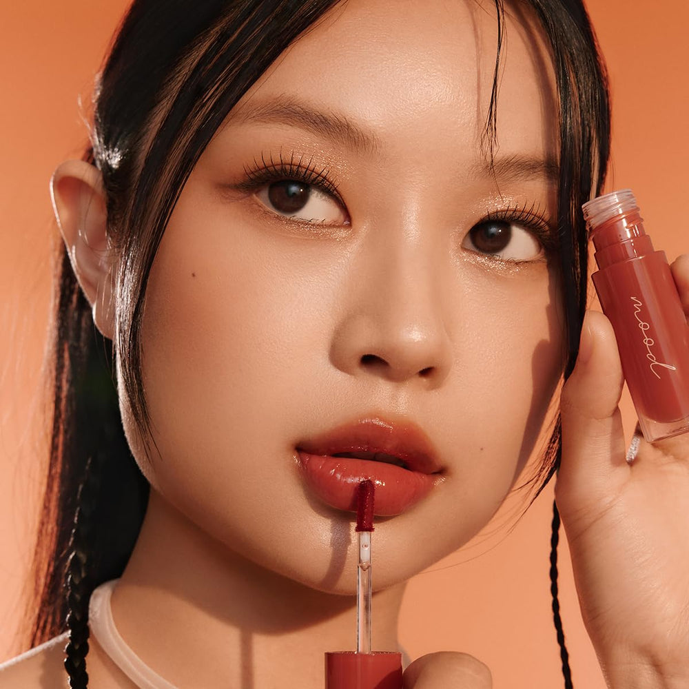 Peripera Ink Mood Glowy Tint packaging display emphasizes premium shade options