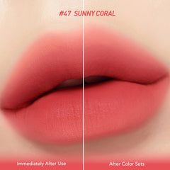 Peripera Ink Velvet Sunny Coral applicator in action for precise application.