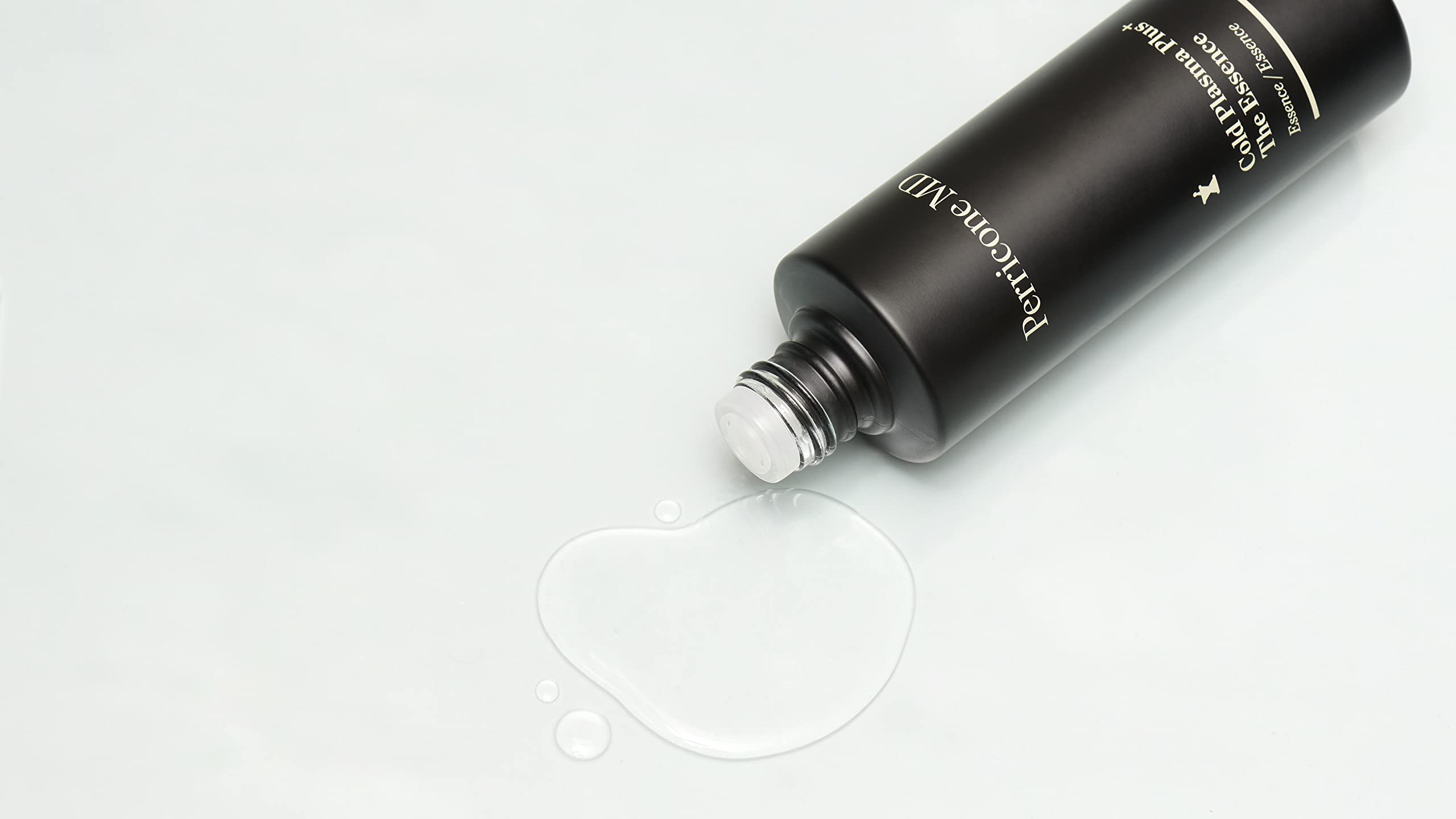 Perricone MD Cold Plasma Plus The Essence massaging onto skin for a smooth look.