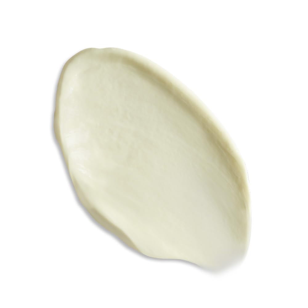 Product near decollete area showing even skin tone.