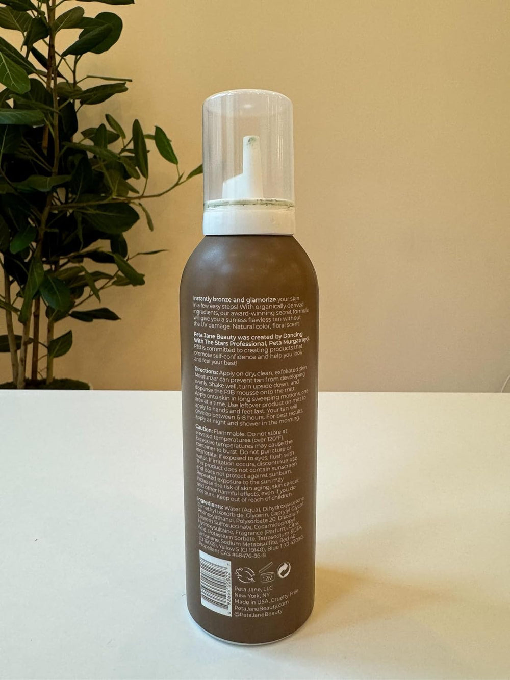 PETAJANE bottle label showcasing Ultra Dark formula for shoppers.