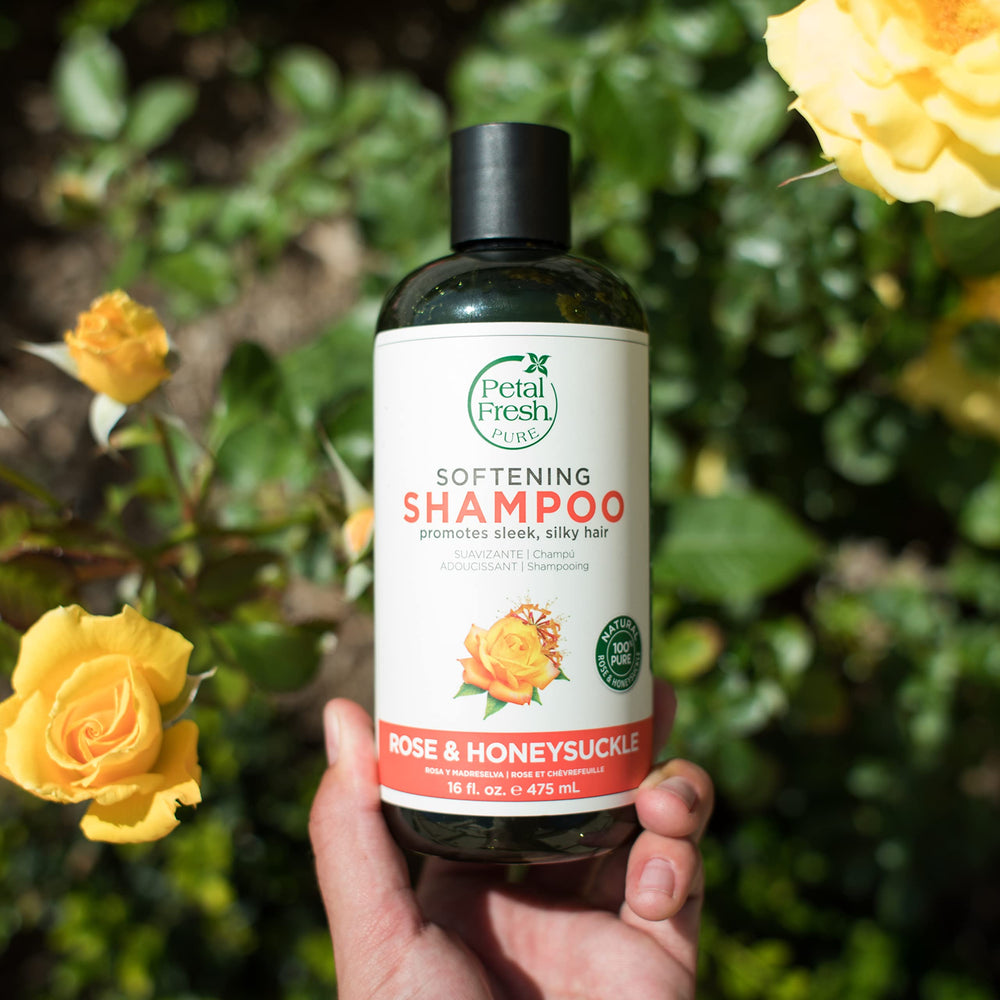 Fragrance swirls around Petal Fresh Rose and Honeysuckle shampoo.