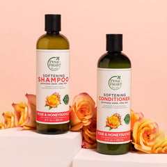 Pouring Petal Fresh Rose and Honeysuckle shampoo showing smooth distribution.