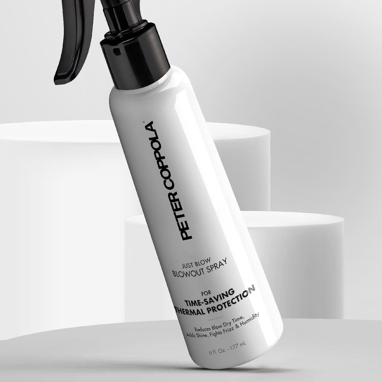 Peter Coppola Just Blow smoothing effect gives shiny, sleek hair finish.