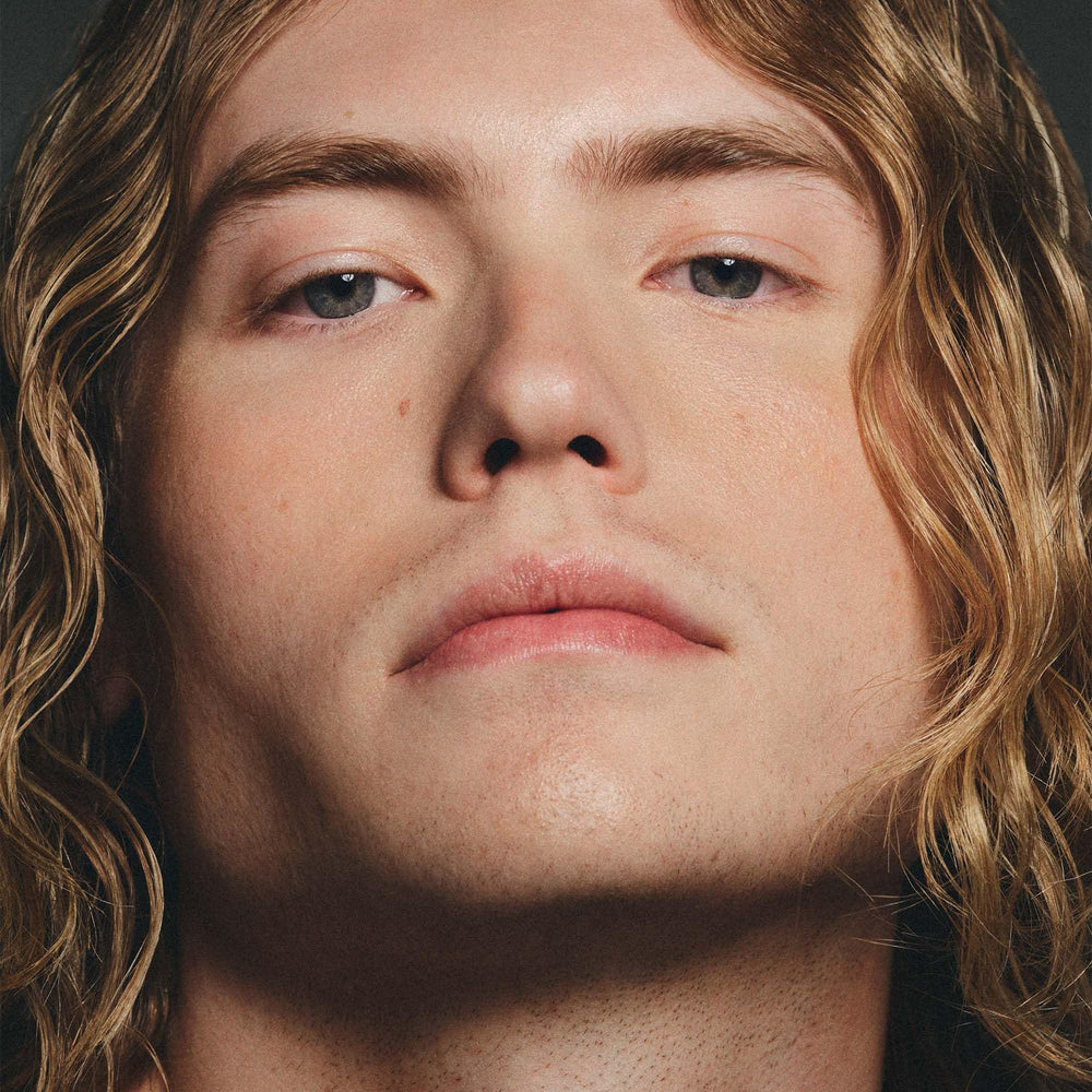 Peter Dundas tinted moisturizer upcycled blueberry seed oil offers antioxidant protection.