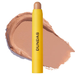 Peter Dundas concealer stick applying precisely for targeted coverage