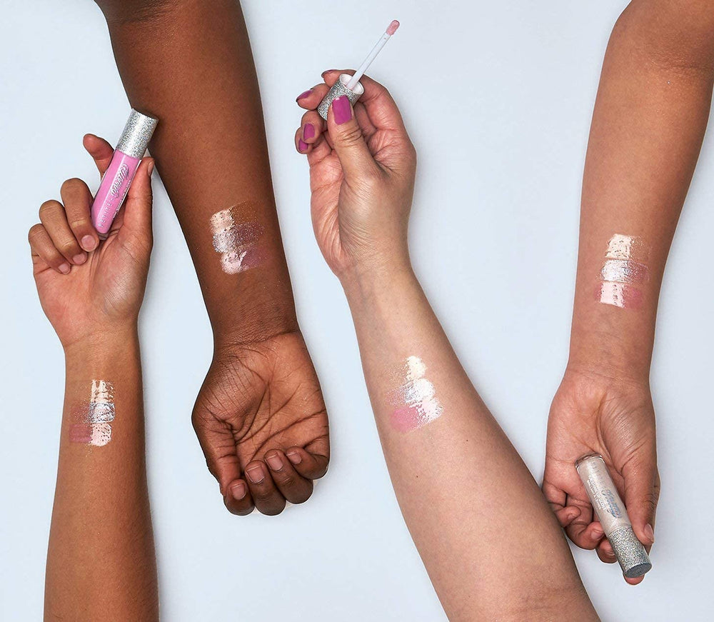 Petite N Pretty 10K Shine Lip Gloss Shell Shocked cotton candy flavor hints delight.