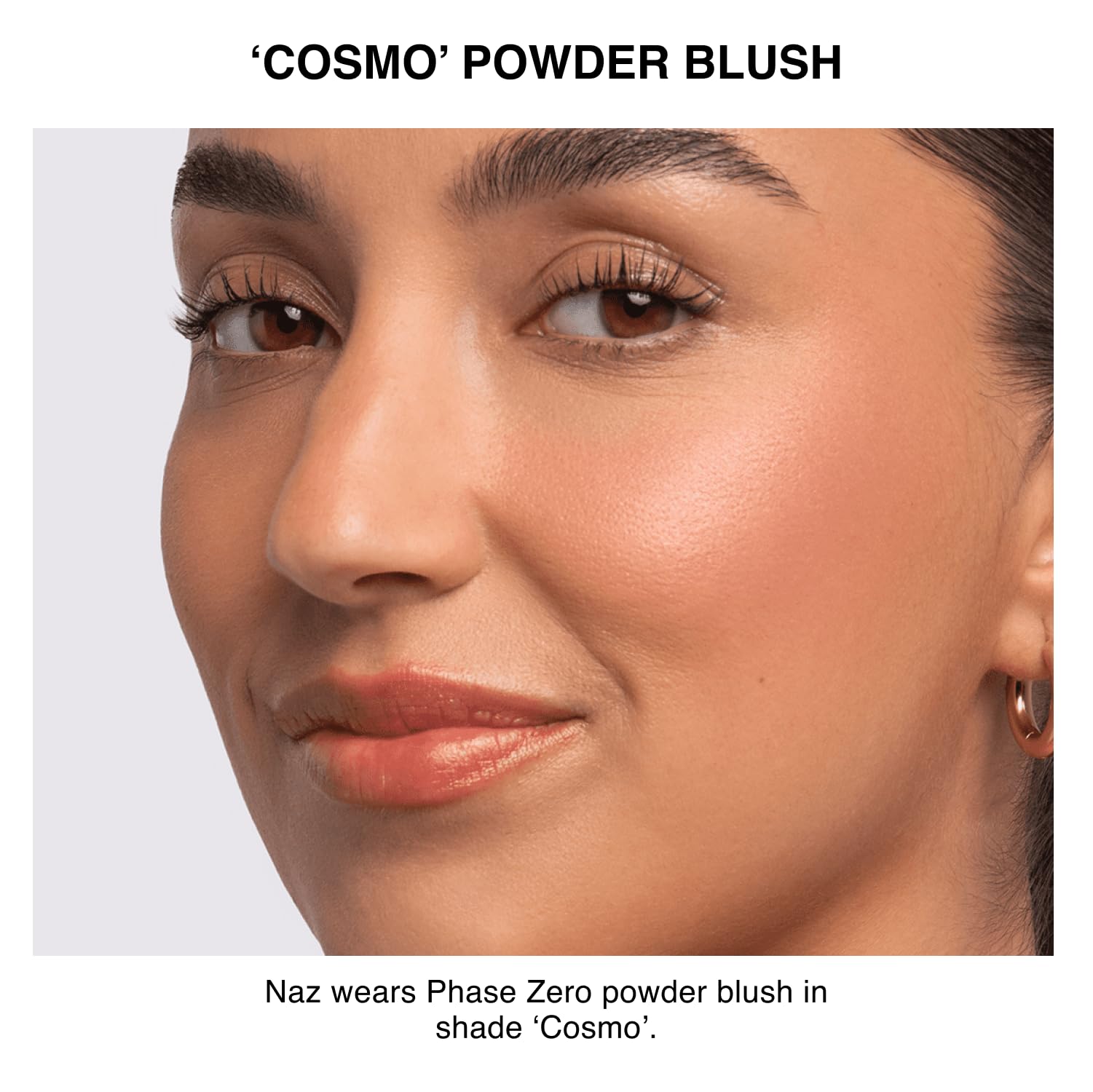 Phase Zero Cosmo application brush demonstrates smooth blush application.