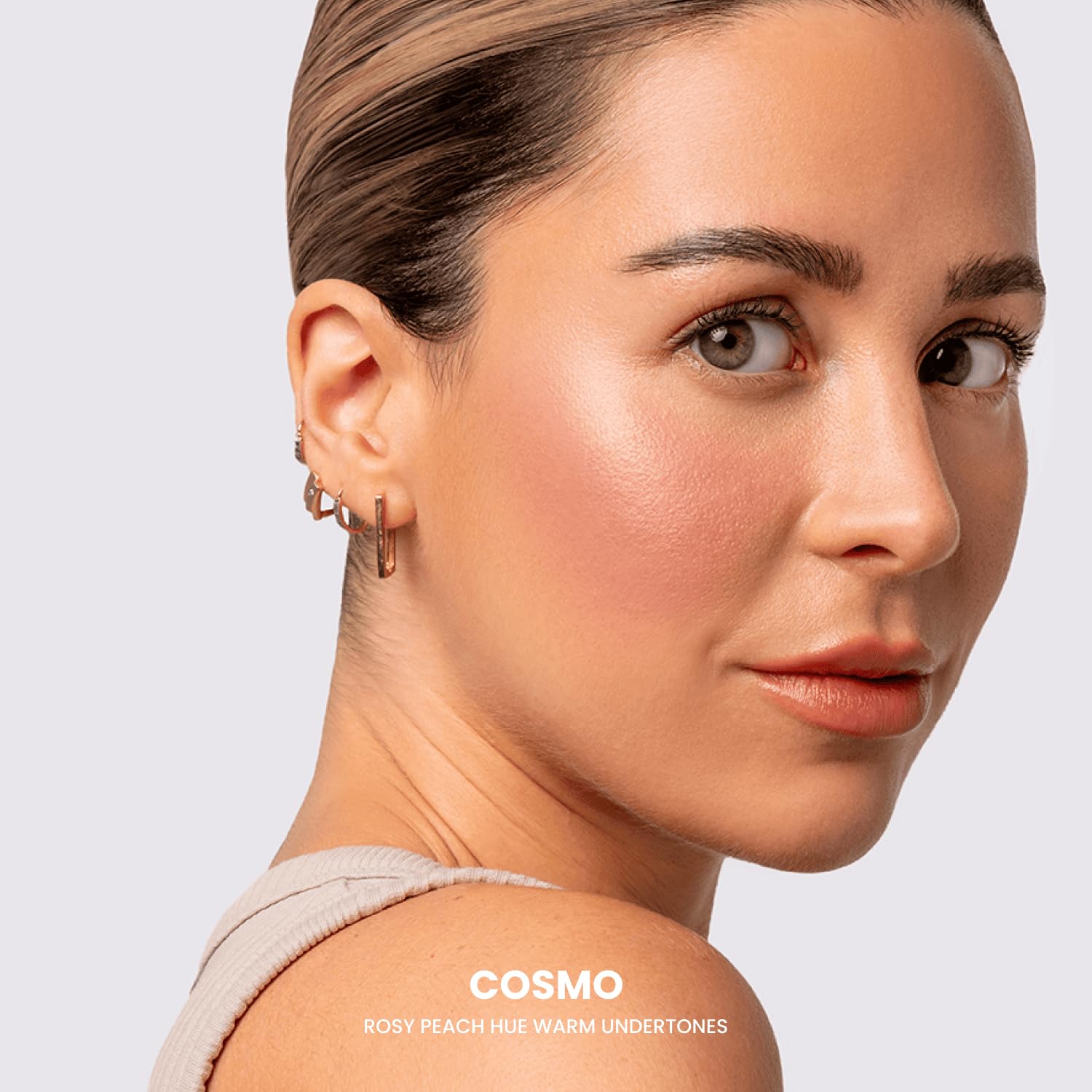 Phase Zero Cosmo coral blush swatch adds warm glow.