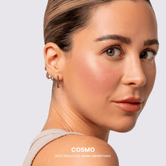 Phase Zero Cosmo coral blush swatch adds warm glow.