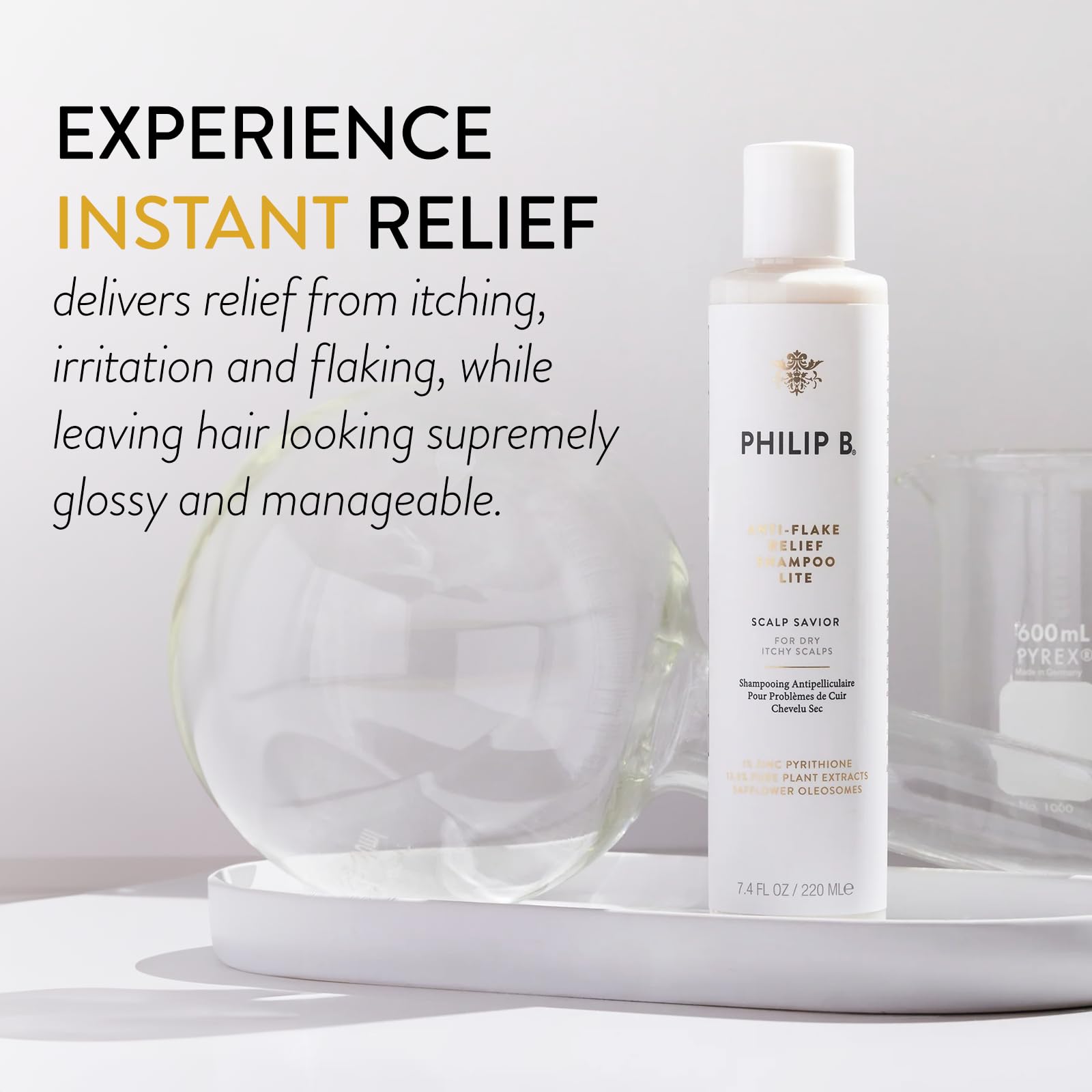 PHILIP B label closeup highlighting botanical blend for calm scalp