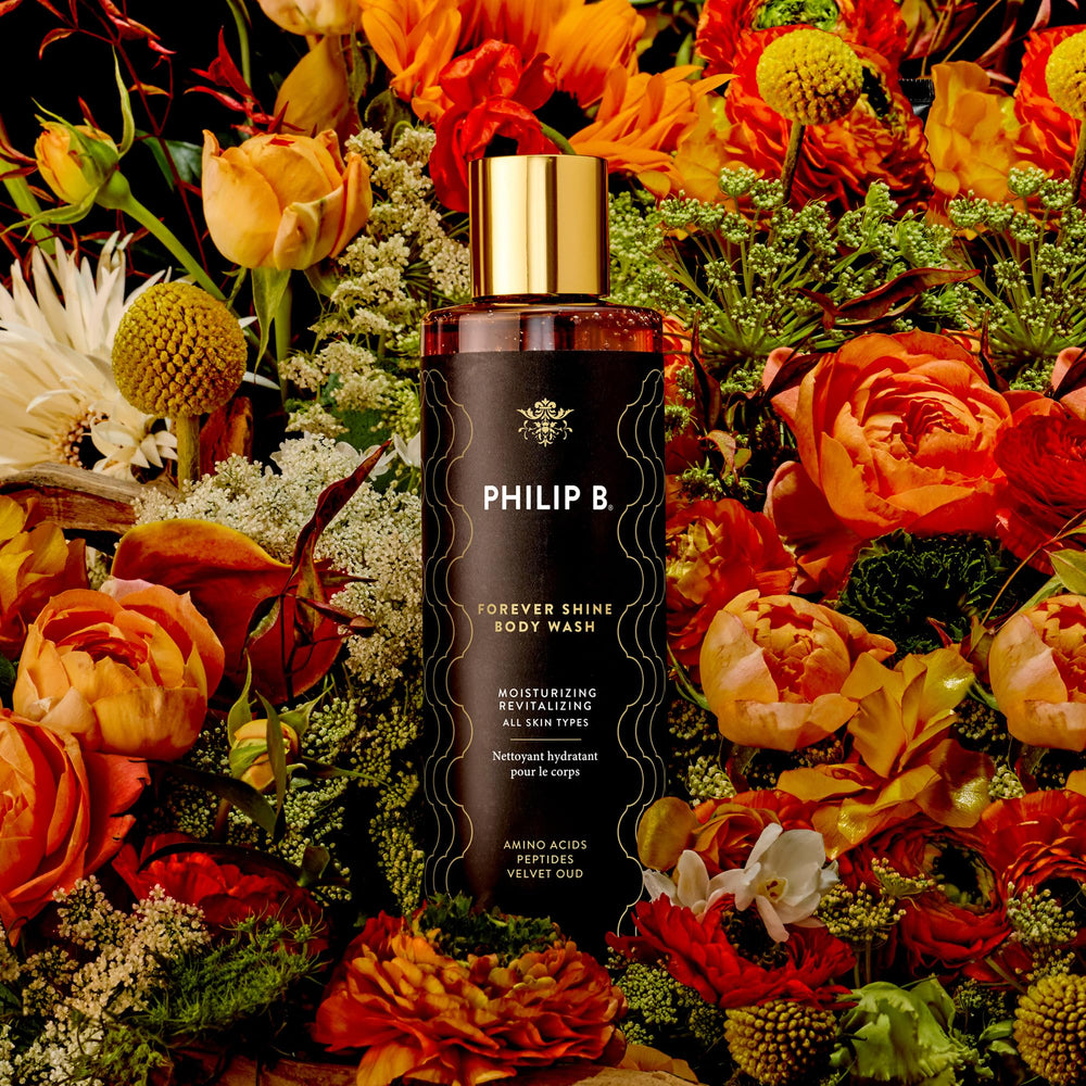 PHILIP B Forever Shine bottle highlighting amino acids and peptides for radiant skin.