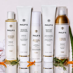 PHILIP B packaging close-up emphasizes Magnolia scent and luxury.