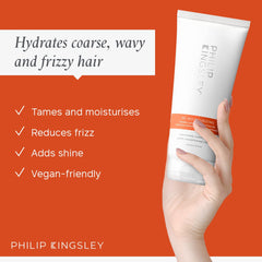 Philip Kingsley Re-Moisturizing Conditioner application shows defined curls and frizz control.