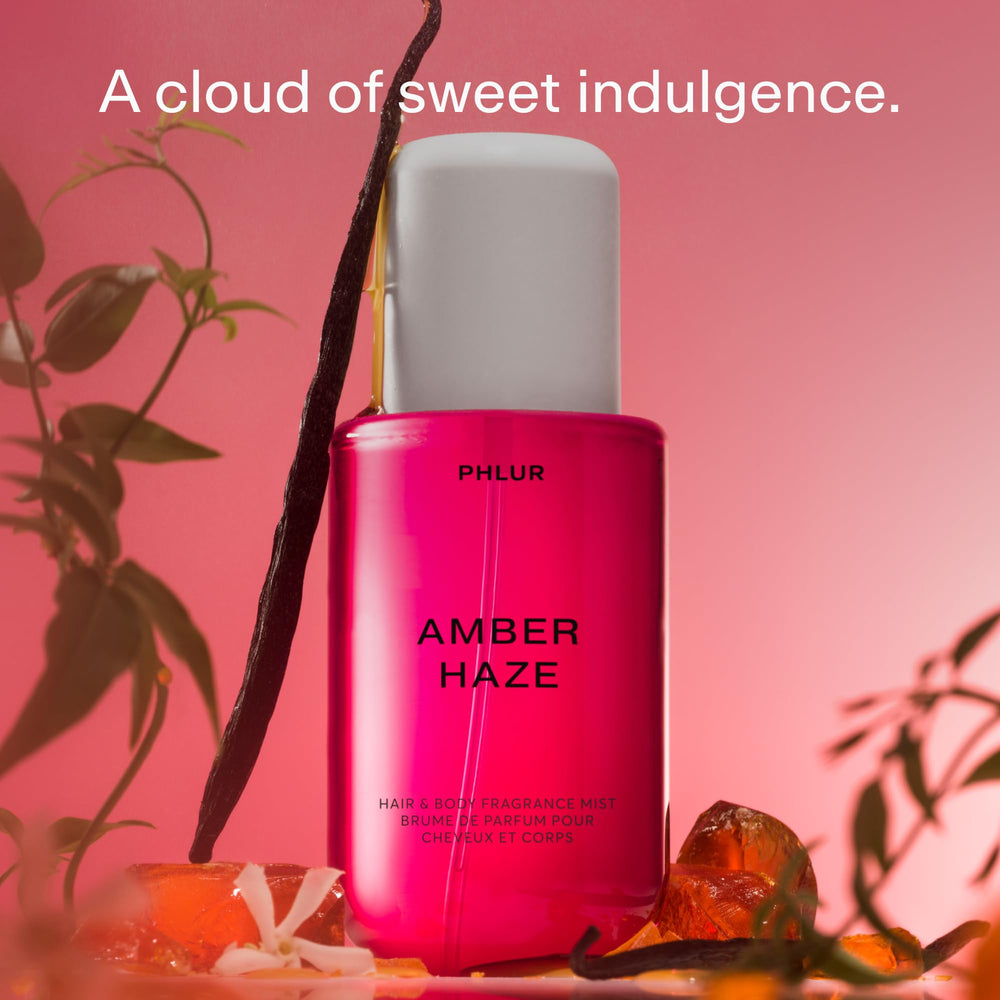PHLUR Amber Haze bottle side view, sleek design for on-the-go use.