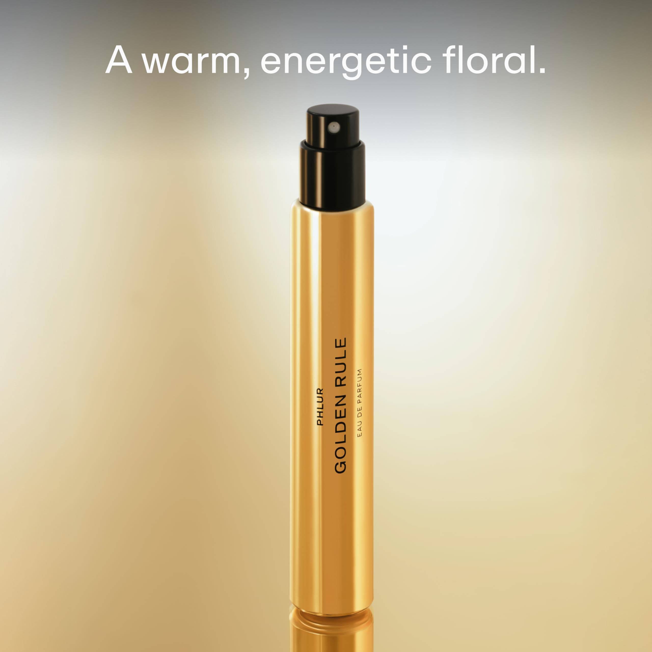 PHLUR Golden Rule bottle pour close-up highlighting warm floral notes