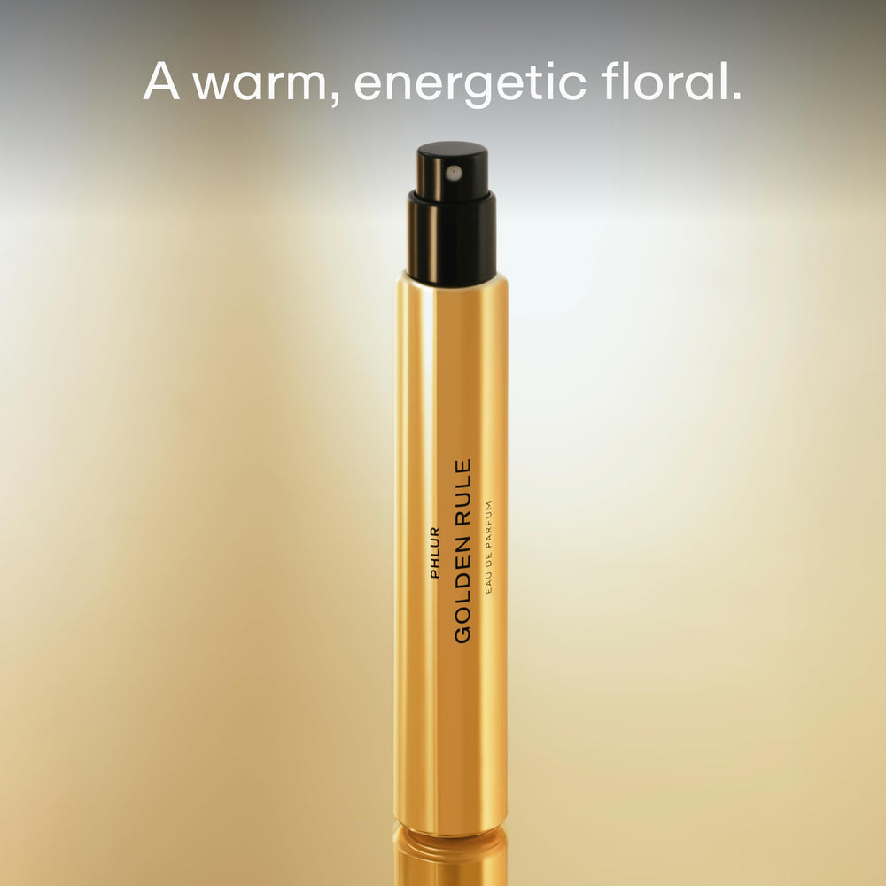 PHLUR Golden Rule bottle pour close-up highlighting warm floral notes