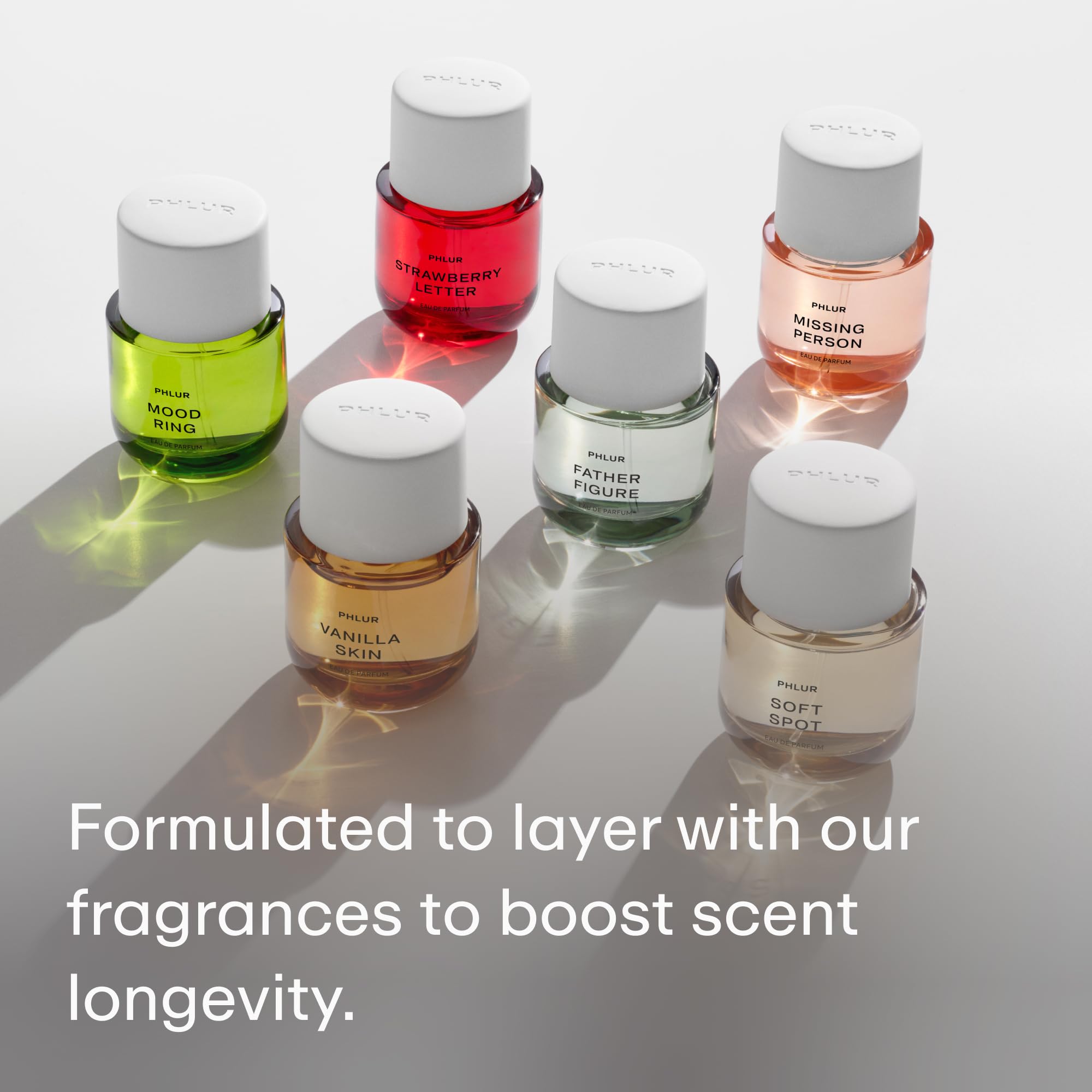 PHLUR Missing Person fragrance layering concept extends scent longevity.
