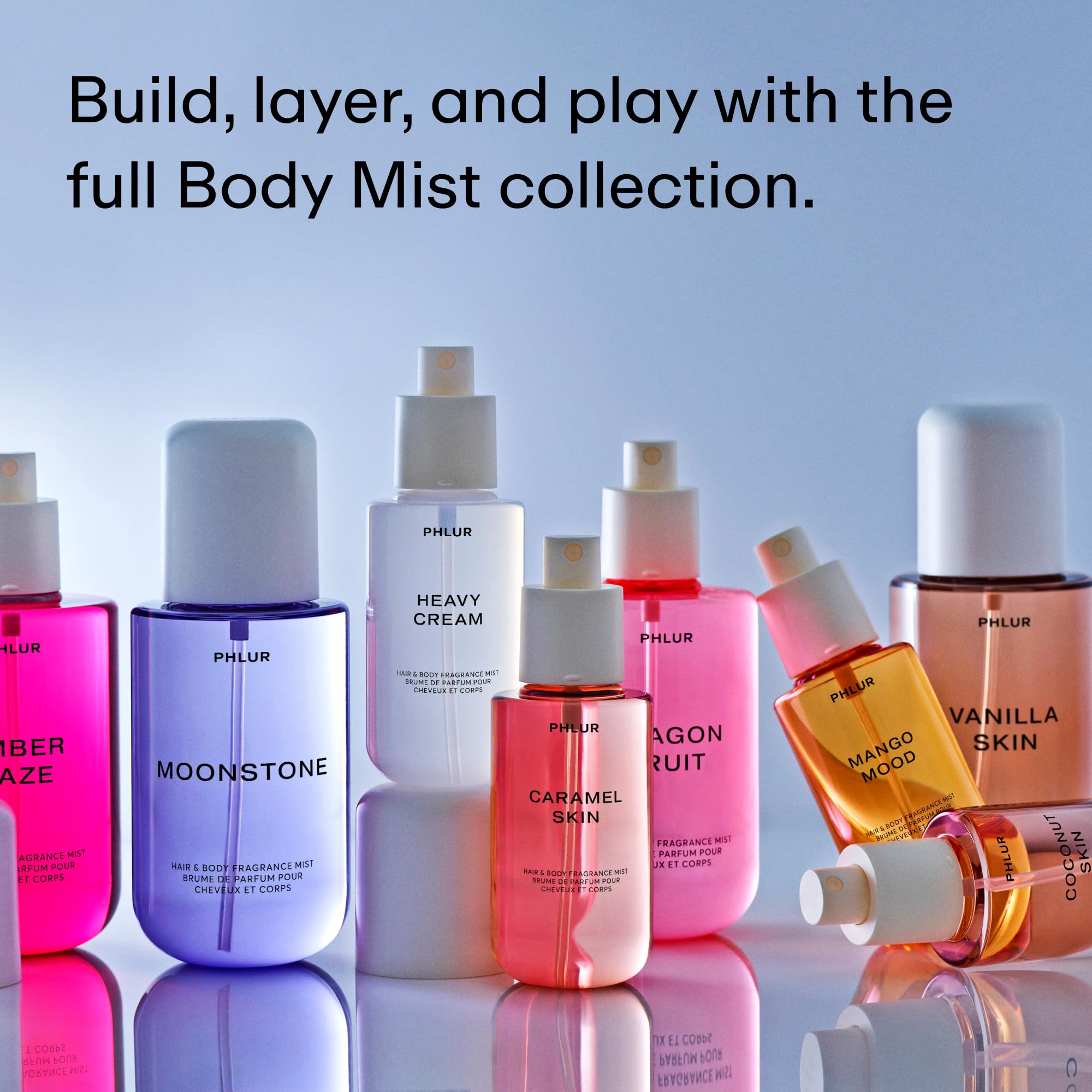 PHLUR Moonstone hands spraying mist for effortless daily scent.