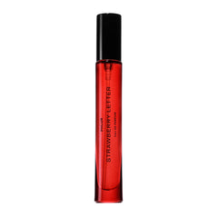PHLUR Strawberry Letter travel-size bottle front, easy to carry for on-the-go fragrance.