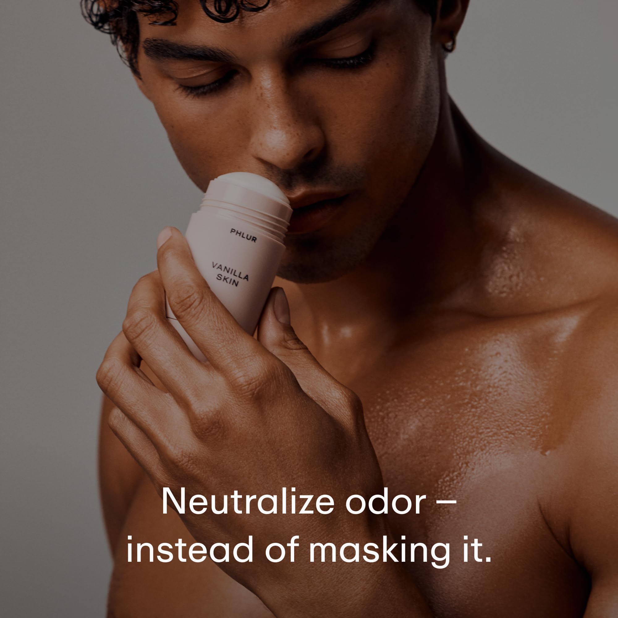 PHLUR Vanilla Skin Deodorant Duo applying underarm with a gentle glide.