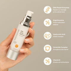Photozyme DNA Youth Recovery Serum applied on cheek, showing silky, fast-absorbing texture.