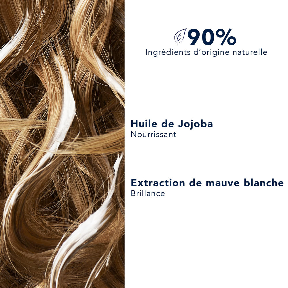 Foamy lather demonstrates light, non-greasy cleansing for dry hair.