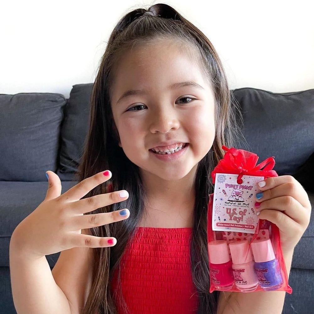 Piggy Paint baby and toddler-safe polish shown in a playful design.
