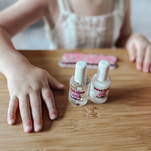 Full-size 0.5oz basecoat bottle included in set.