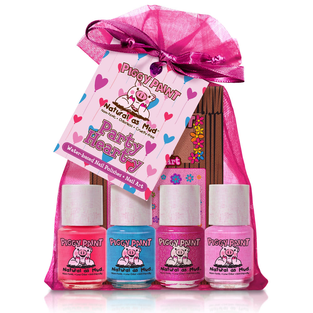 Piggy Paint Party Heart-y Gift Set with four polishes and playful nail art for kids' creativity.