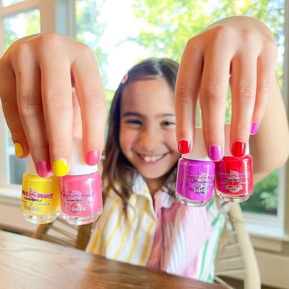 Piggy Paint nails drying with warm air after application.