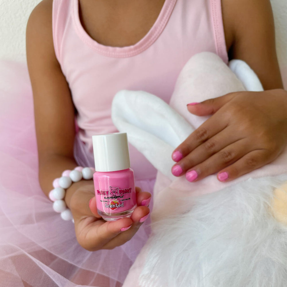 Piggy Paint swatches on nails show opaque, bright colors.