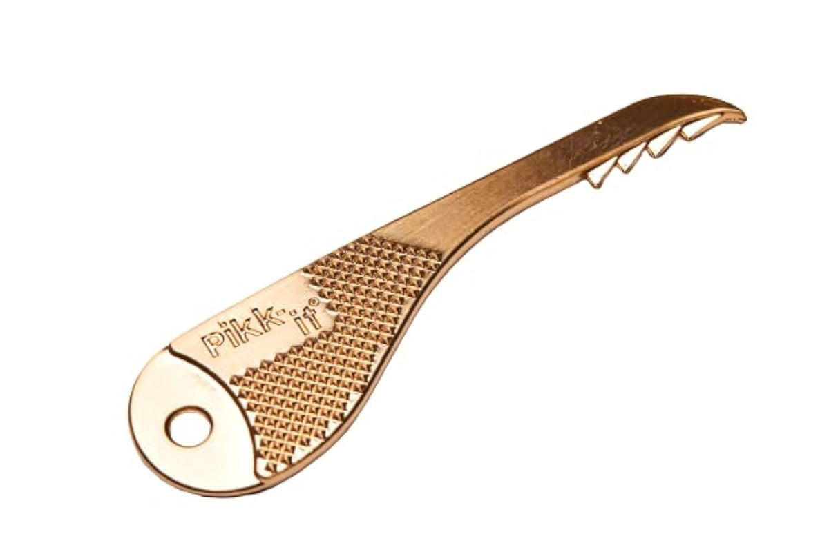 Pikk-it vacuum hair rake with zinc teeth cutting through tangled hair