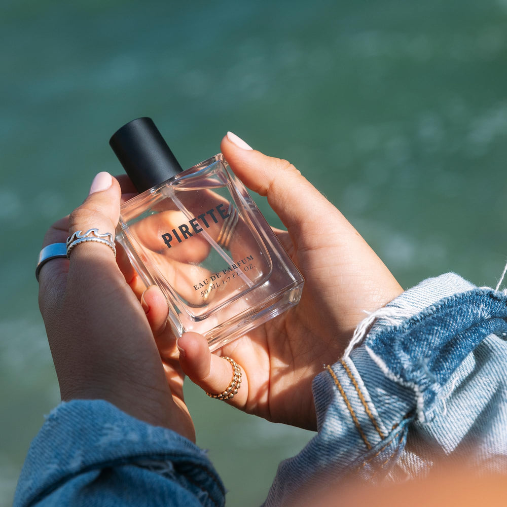 Pirette beach-inspired fragrance box enhances display and gifting appeal.