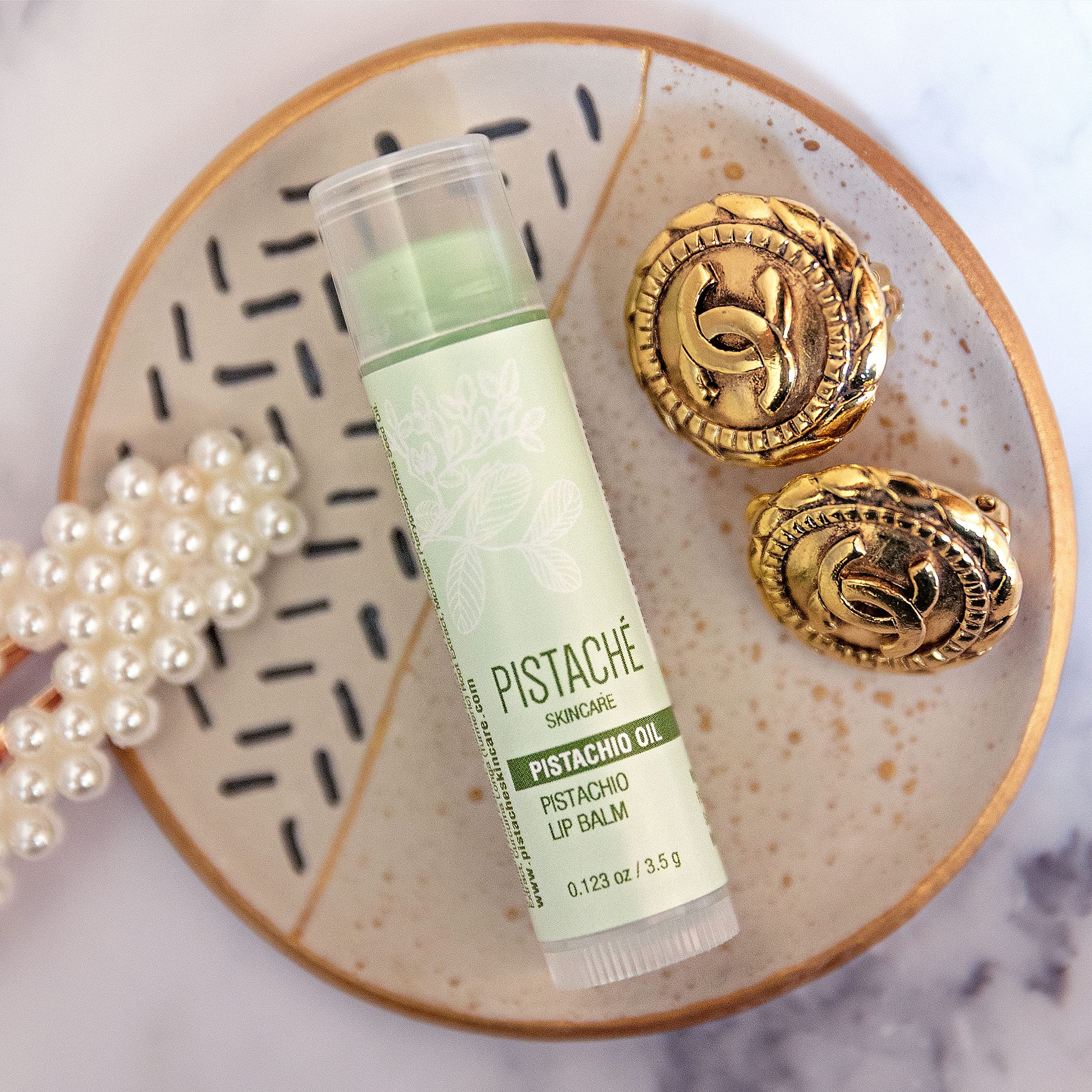 Cruelty-free packaging with wind-energy print signals ethical lip care