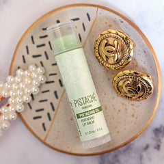 Cruelty-free packaging with wind-energy print signals ethical lip care