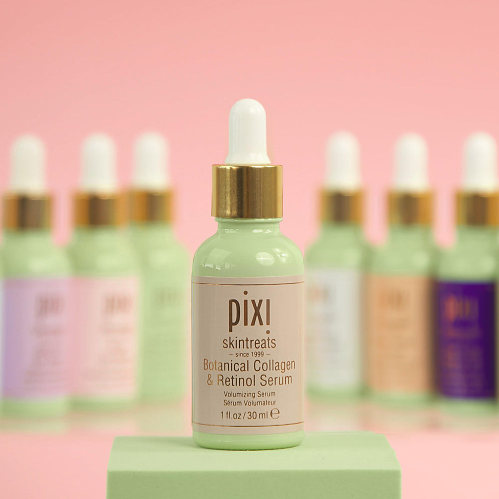 Pixi Beauty serum vial in hand, ready for nightly skincare.