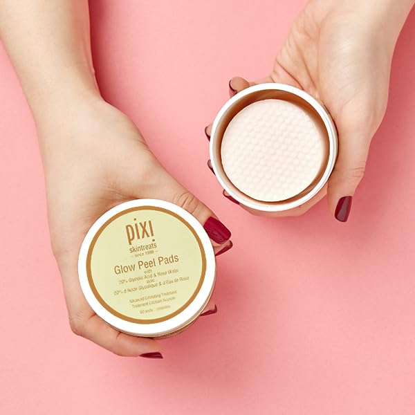 Pixi Glow Peel Pads applying to the face for gentle exfoliation