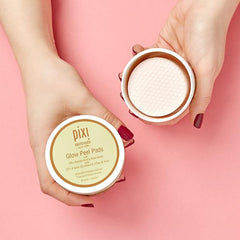 Pixi Glow Peel Pads applying to the face for gentle exfoliation