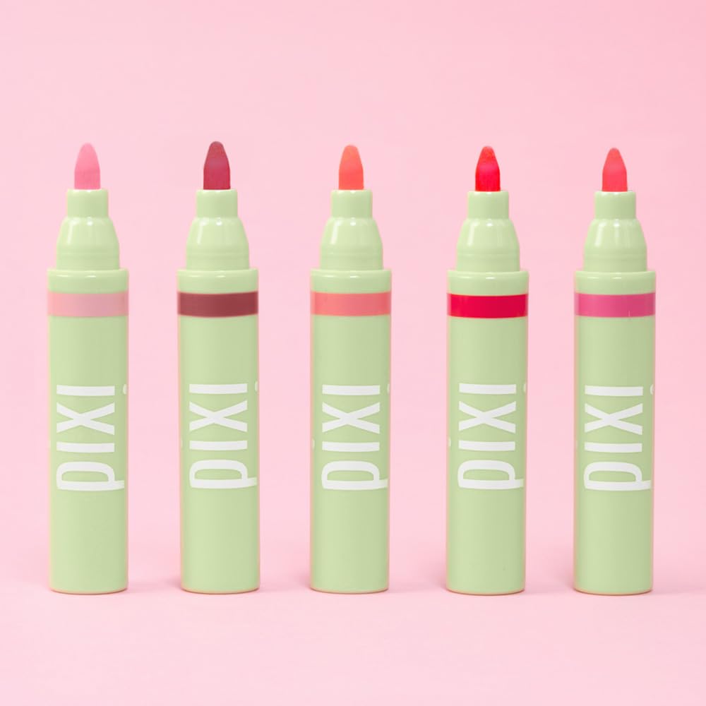 Applying Pixi LipBlush Purity on lips for a sheer finish.