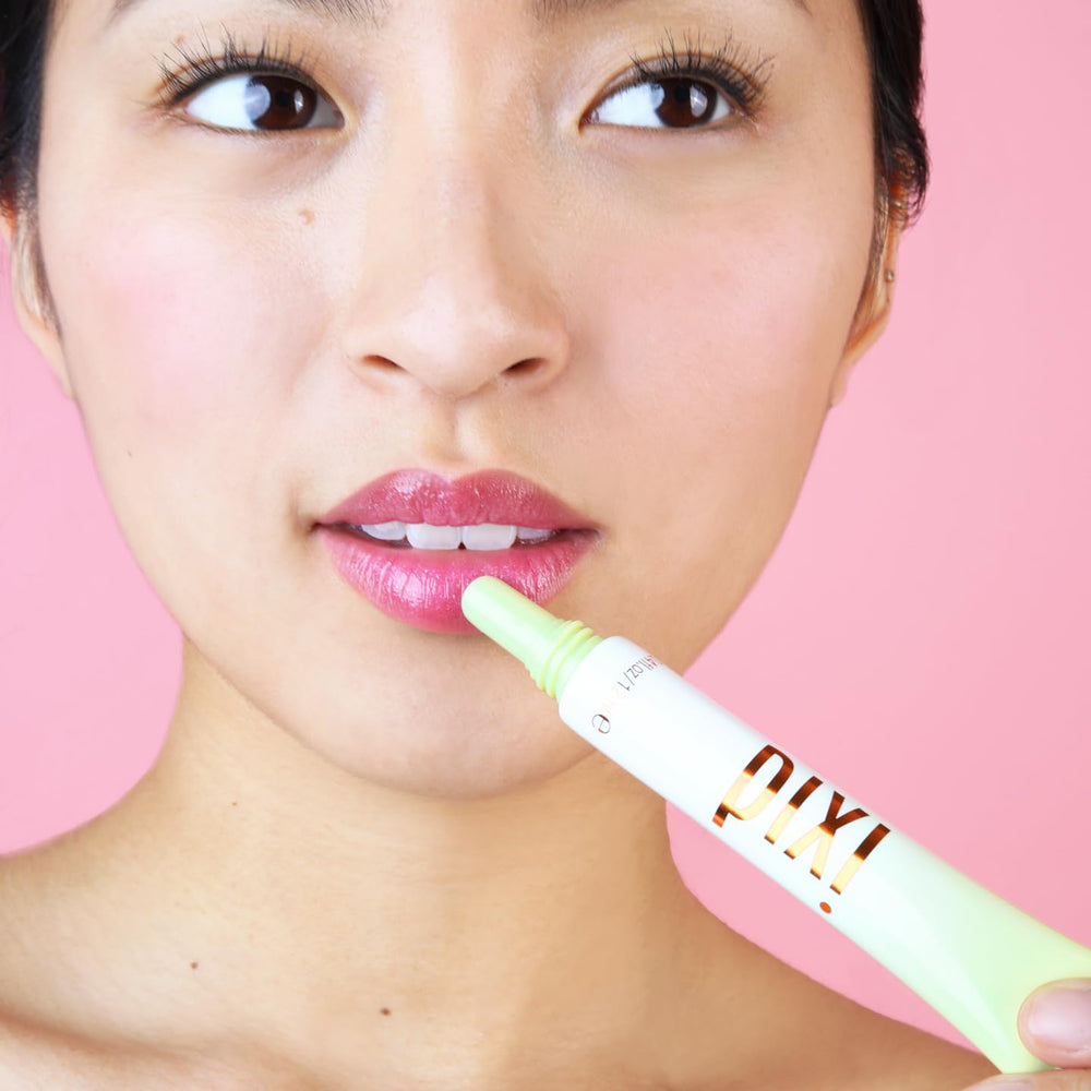Pixi LipTone PinkPatina on lips demonstrates glossy, reflective shine.