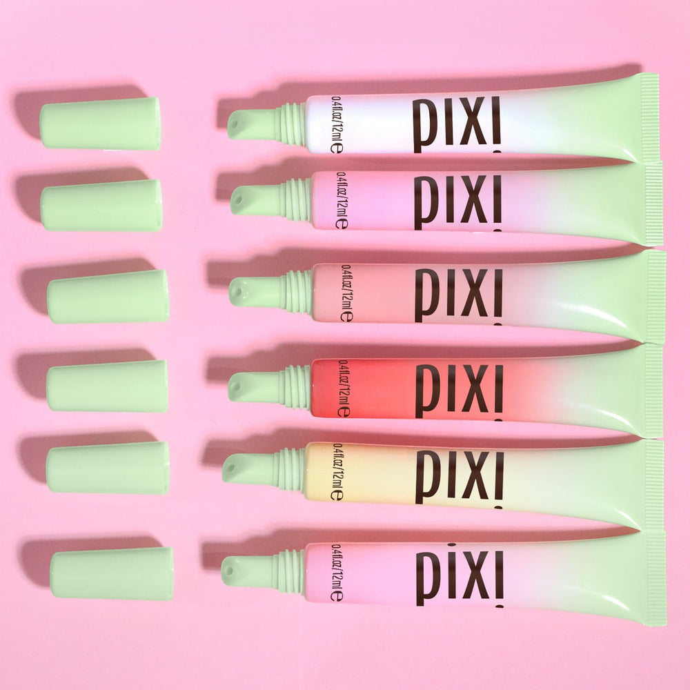 Swatch of Pixi LipTone PinkPatina on the arm reveals soft pink shimmer.