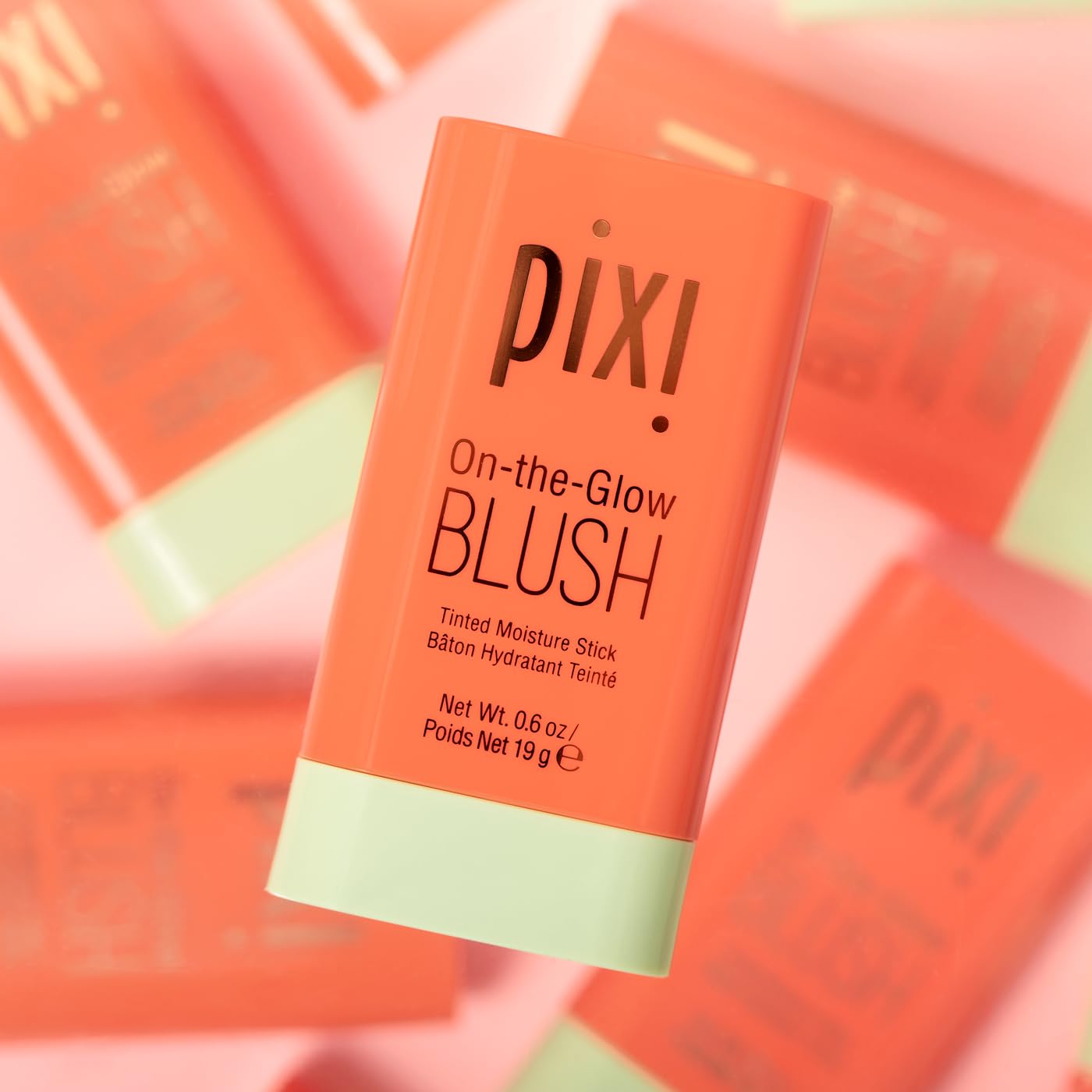 Natural glow finish of Pixi On-the-Glow Blush on warm-toned skin.