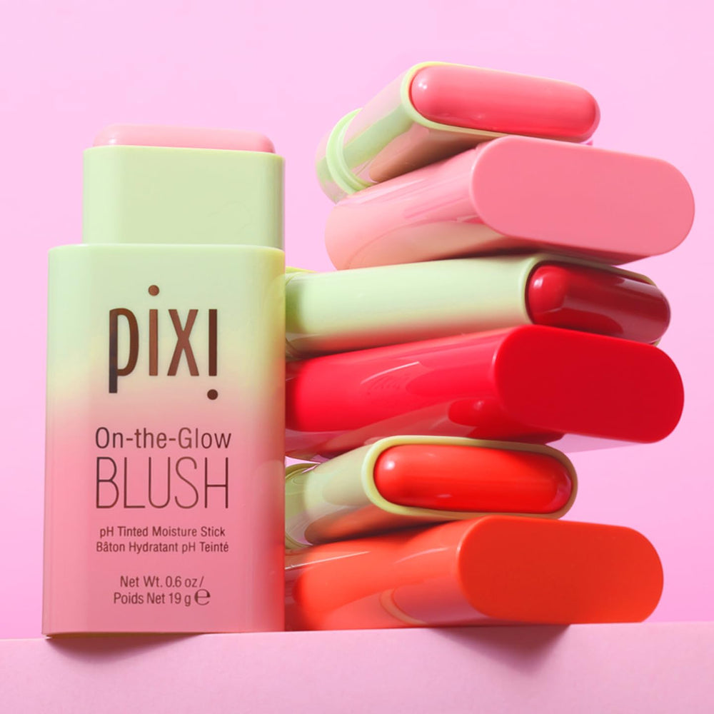 Pixi On-the-Glow Blush Ruby twist-up applicator shown in use