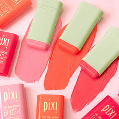 Swatches of Pixi On-the-Glow Blush on the skin for a dewy glow.