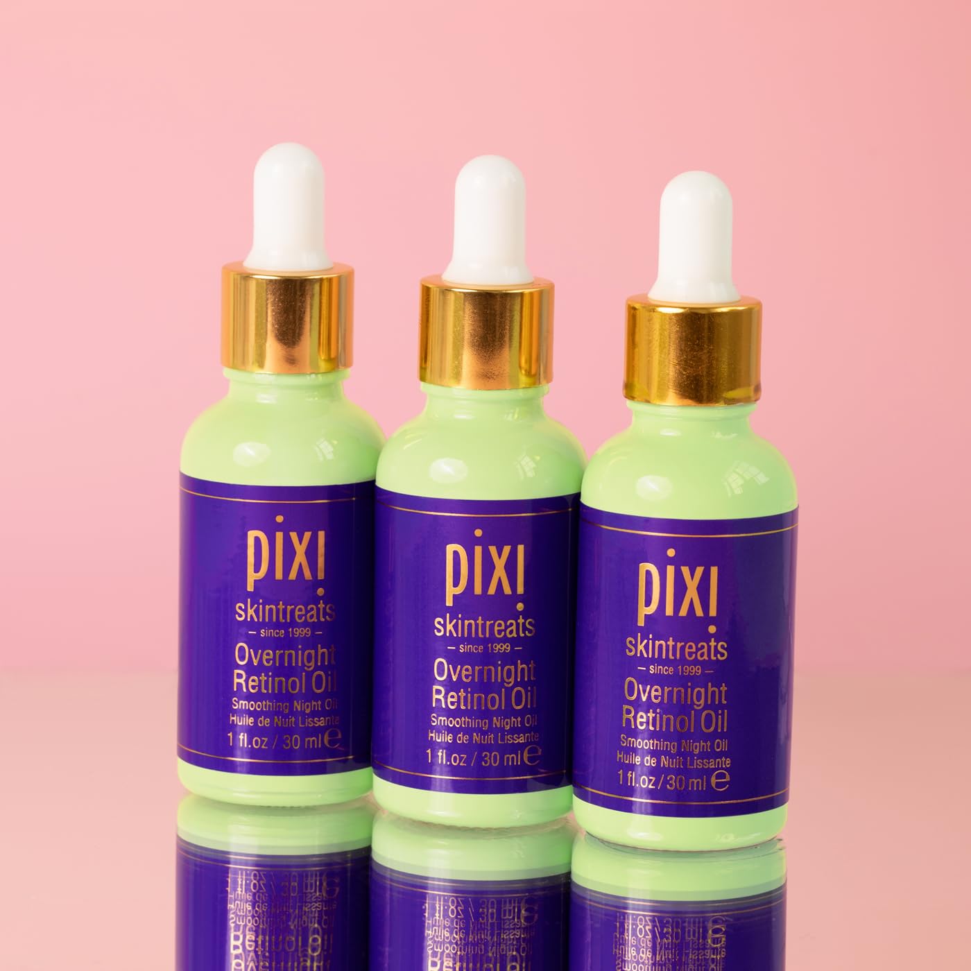 Pixi Beauty Overnight Retinol Oil application-closeup shows gentle massage aiding absorption.