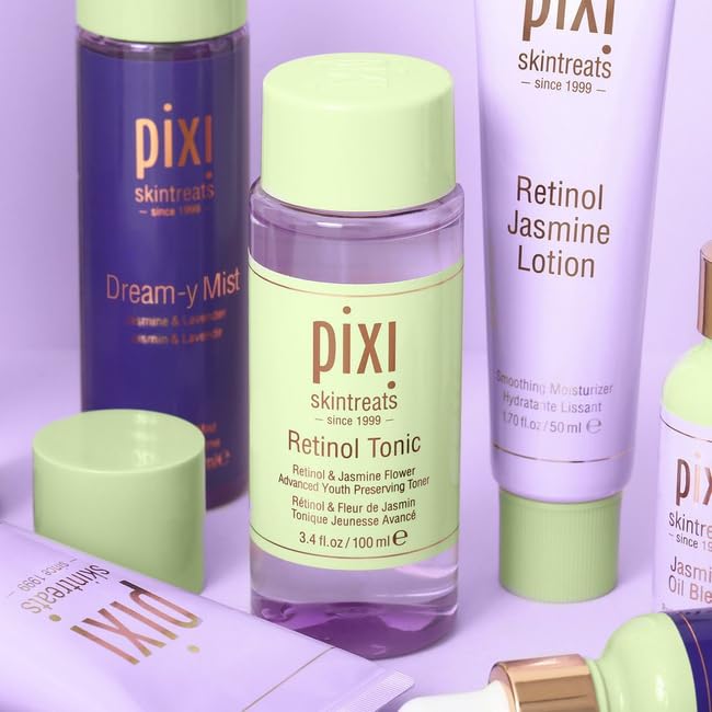 Pixi Retinol Tonic cotton pad swipe for even application