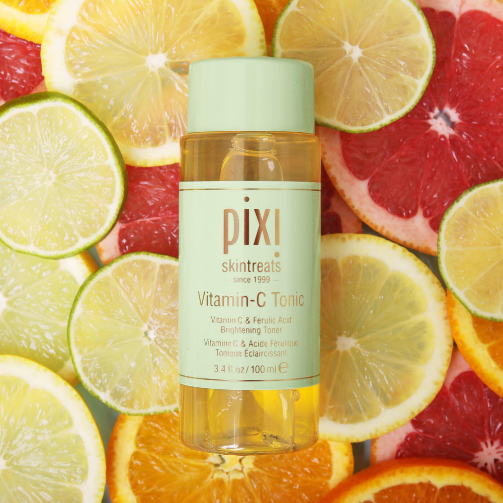 Pixi Vitamin-C Tonic featured in a skincare routine with serums and moisturizers.
